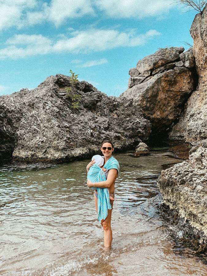 Summer wading with her baby in the cove at Playa Forti, Curaçao