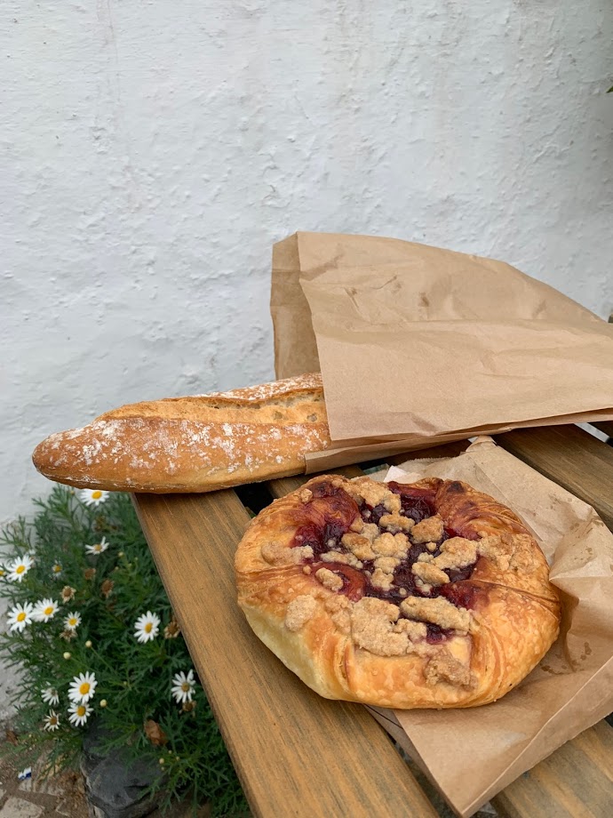 Fresh bread and a fruit galette from A Padaria bakery in Aljezur