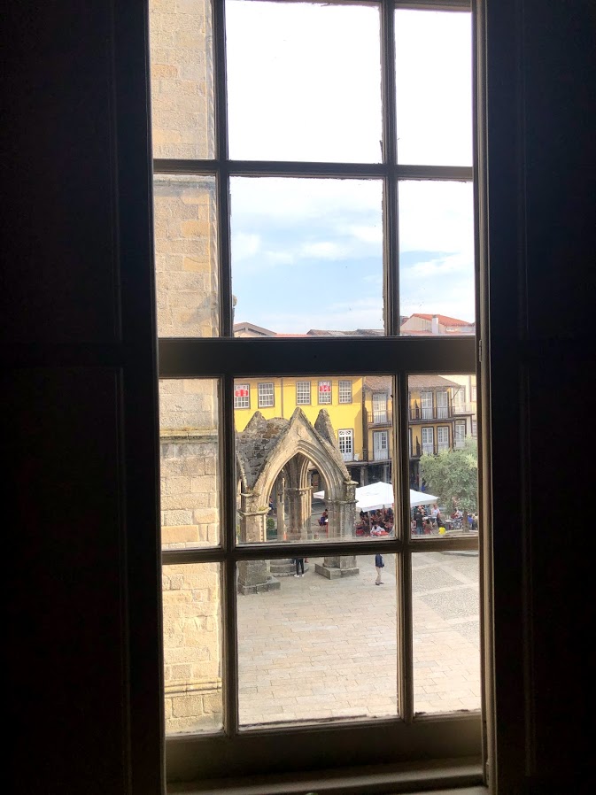 View of Largo da Oliveira square through the hotel window in Guimarães