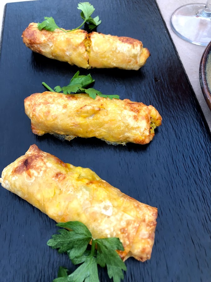 Portuguese tapas served on a slate board in Guimarães