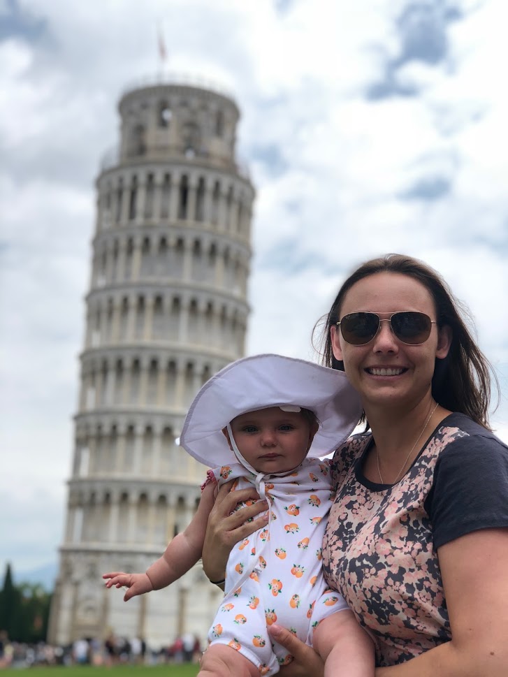 Summer and her baby in front of the Leaning Tower of Pisa