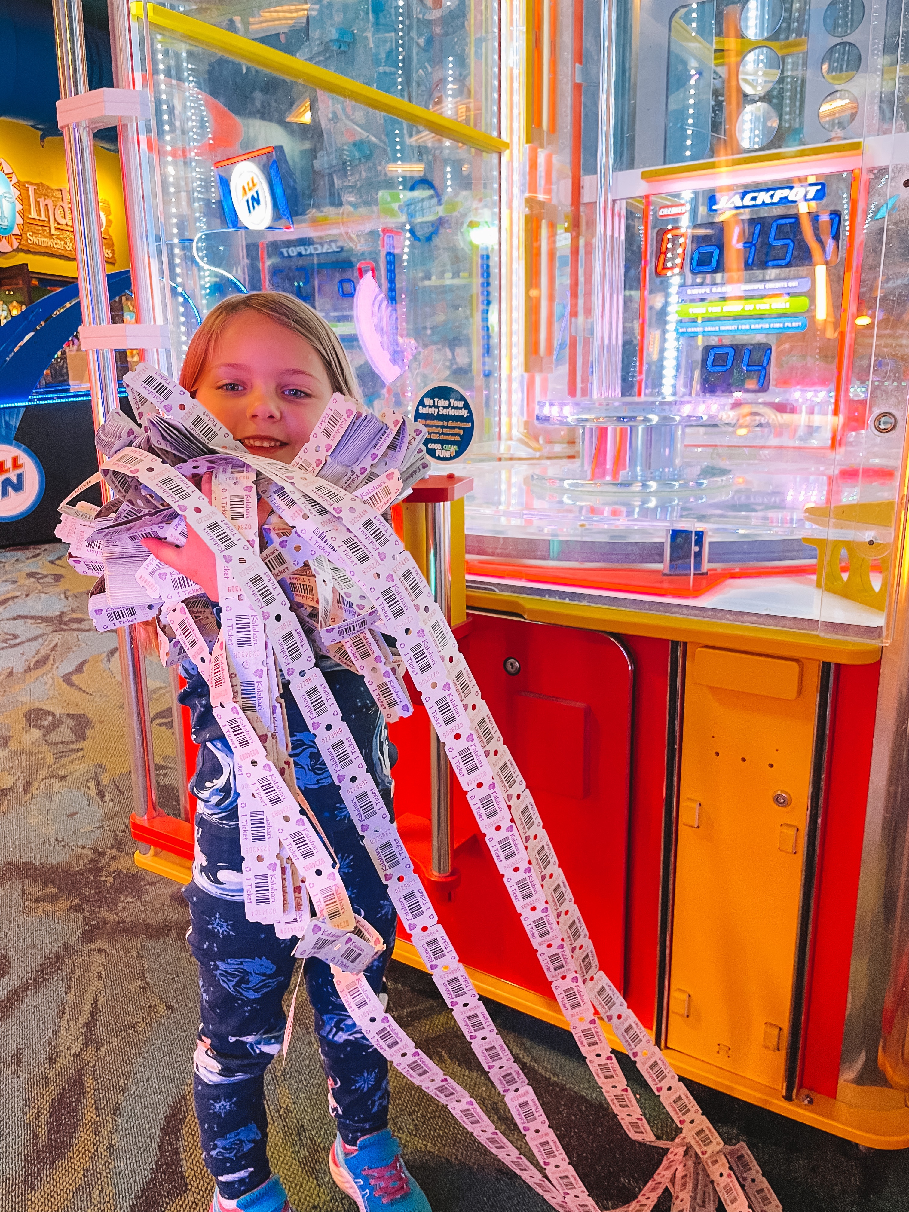 Summer's daughter covered in arcade tickets at Kalahari