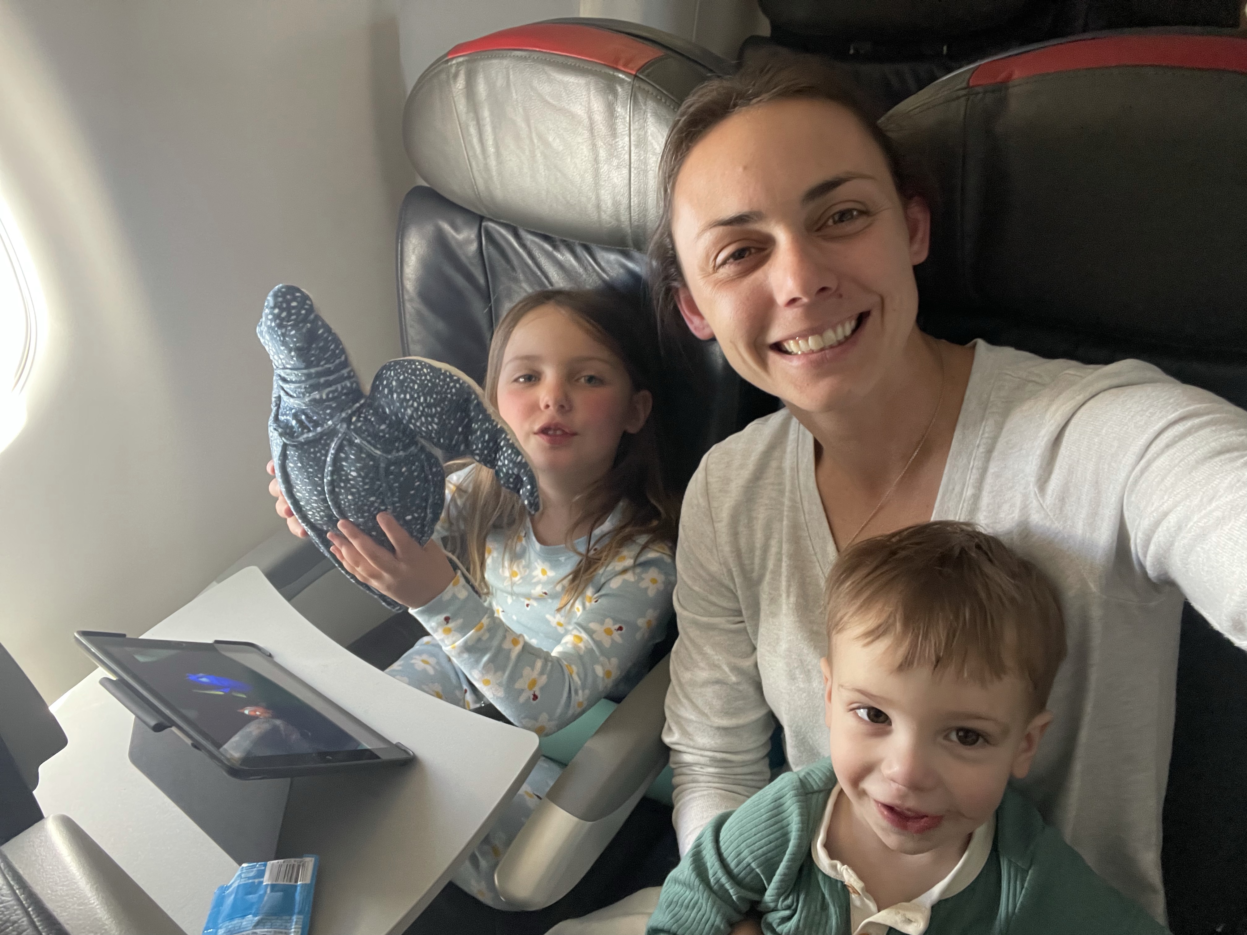 Summer and her kids on the plane