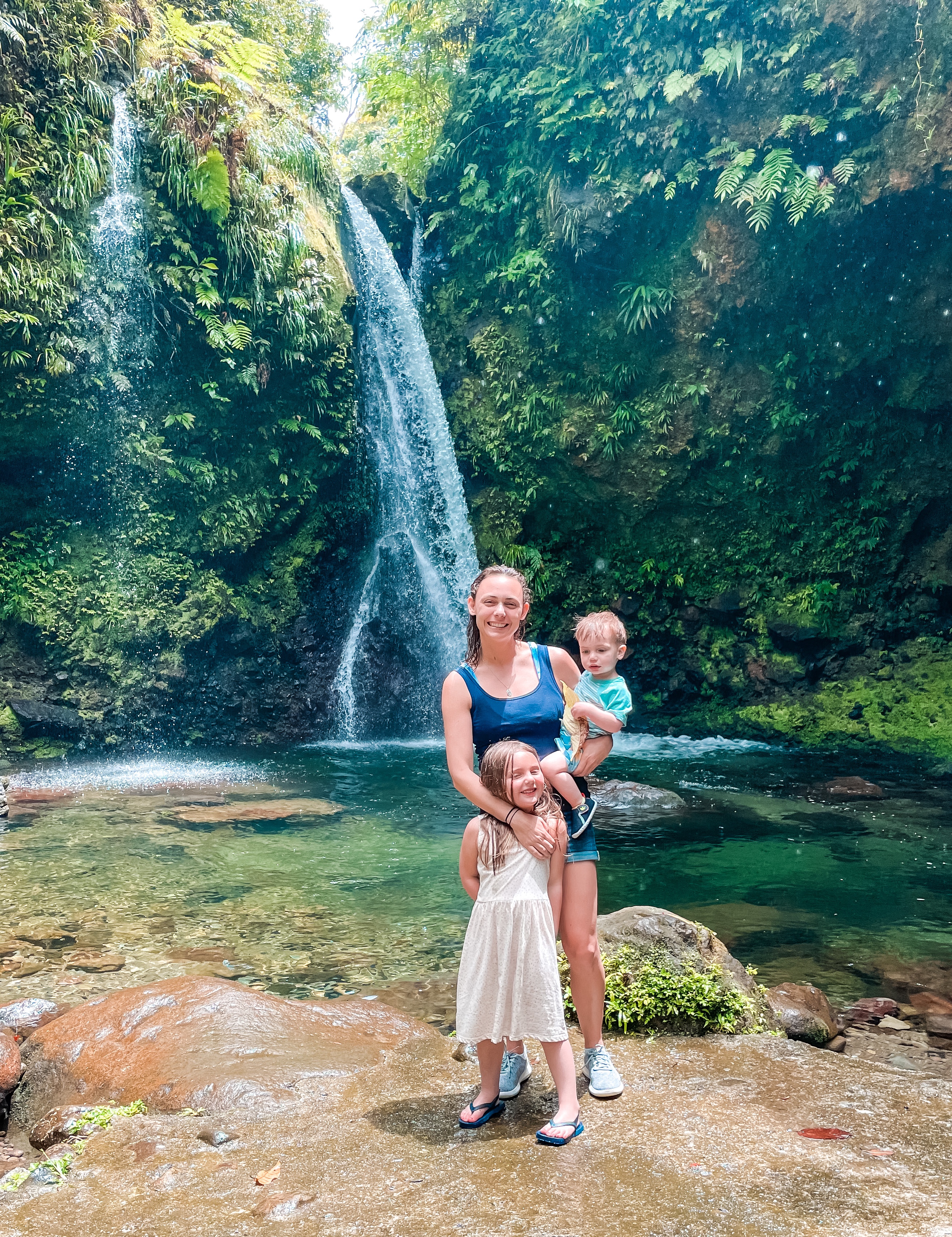 Summer and her kids in front of Jacko Falls in Dominica