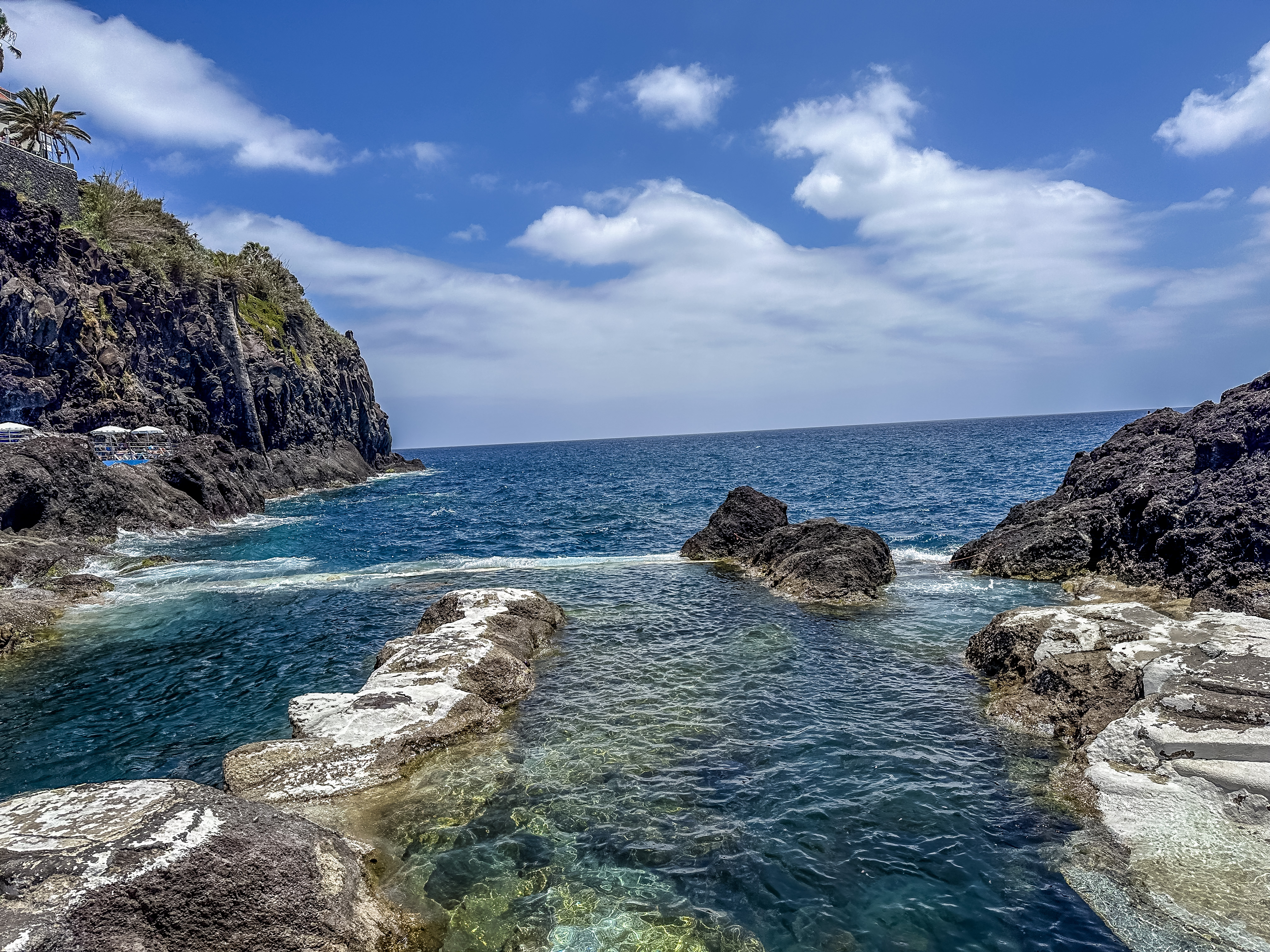 Clear water and lava rocks along the coast of Madeira